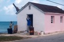 Small cottage next to the dinghy dock in Bight being painted by locals when we came ashore.