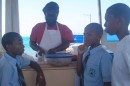 The locals love conch salad and these boys came straight from school to get some.