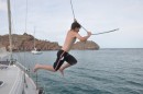 Jumping in with the help of the jib halyard.