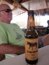 Eric relaxing at the palapa with a new beer he found, Baja Blonde.  Very good, brewed in Cabo San Lucas.