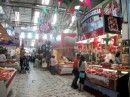 Mercado...market, fruit stands, meat stands, fish stands, stands, stands, stands.