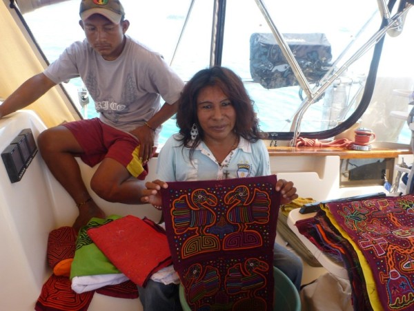 Lisa is a Master mola maker.  I read somewhere that if a family has too many boys they may raise one of them as a female.  Lisa was born a male but raised as a female.  She is one of the most famous mola makers in the San Blas.