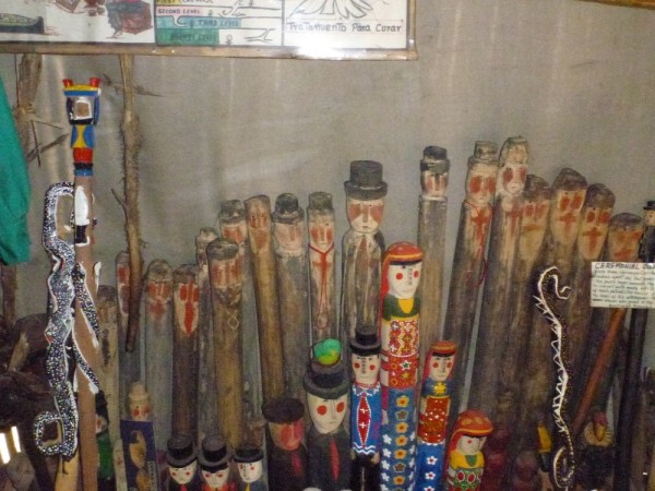 The village ploce have decorated clubs that signify their status as keepers of the law.  The clubs are strctly symbolic and are nevr used as a weapon