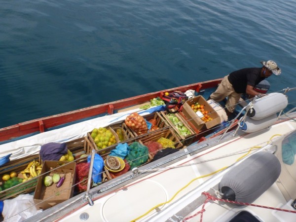 The "veggie boat" delivers much needed fruits and veggies from the mainland.  Occasionaly they will have beer or wine.  Sometimes you may get 2 or 3 different boats in one week,  and you may not get another boat for 3 weeks.  Going to a store is not really an option when you are cruising in the outer islands.