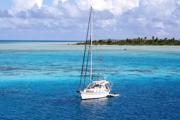 Enchantment anchored in Anse Amyot on Toau atoll