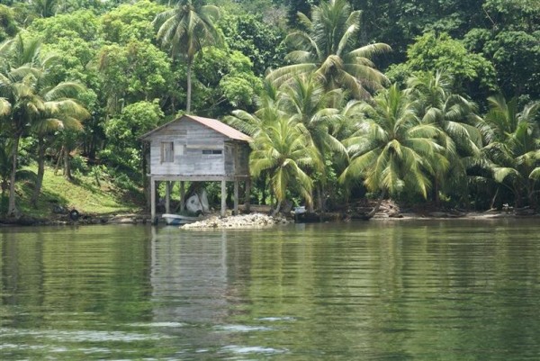 Typical small mayan home along the river