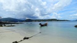 looking toward S end of Phuket Island a few miles away.  We were anchored over there.
