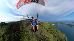 They told us it was safe.: While we were anchored off Nai Harn beach we would see these para-gliders flying around every afternoon.  We tried it and loved it.  Not scary at all.  Flights last 20-30 minutes bit the man I flew with has been in races where he was air born for 8 hours.  I didn