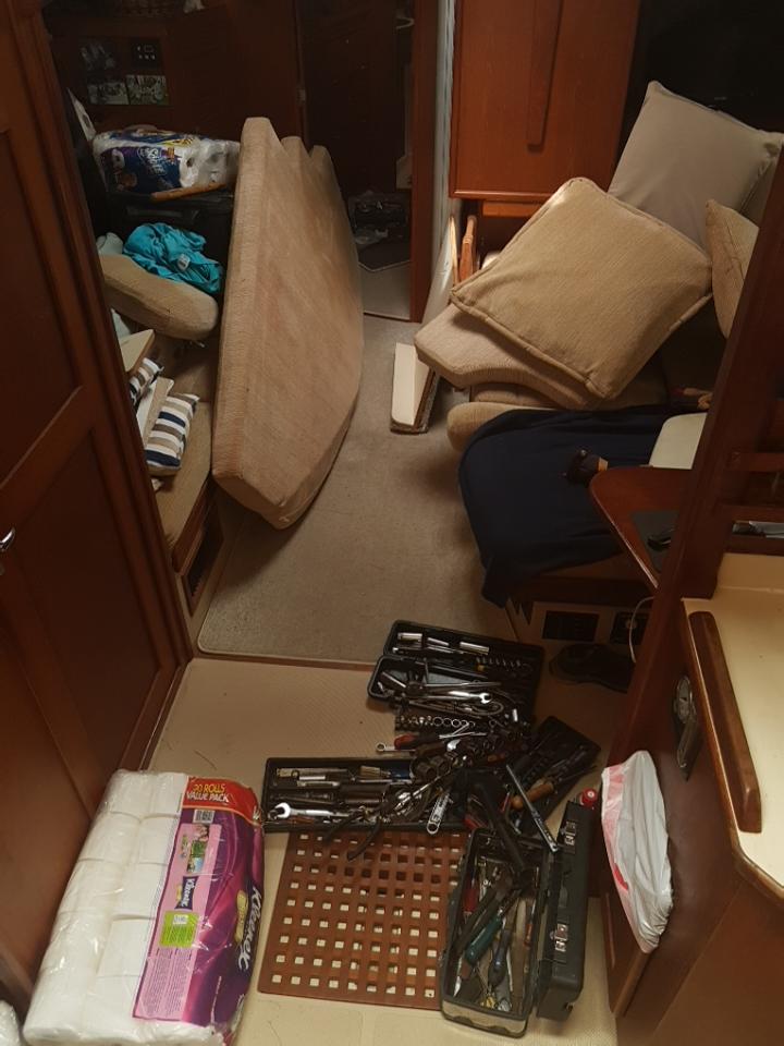 Even a fairly simple job creates a big mess.  I have tools and parts spread around in several areas and by the time I gather everything I need it is chaos inside the boat.  Good thing Michelle was still in the States.  Not sure I had room for her too.
