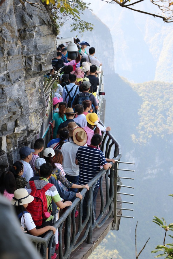 A popular spot is the glass walkway clinging to the side of the mountain, a thousand feet above the ground.