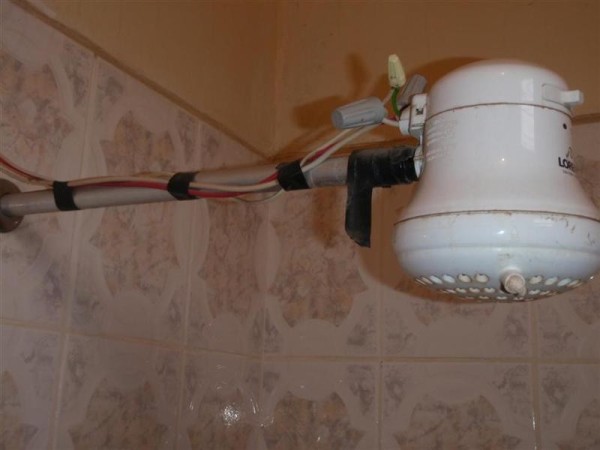 Most budget hotels have we affectionately refer to a "suicide showers".  The water is heated in the shower head,  note the typical elctrical wiring,  probably would not pass an OSHA inspection