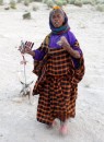 Nomad woman in desert near Nefta