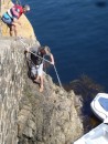 Abseil down the rock face...