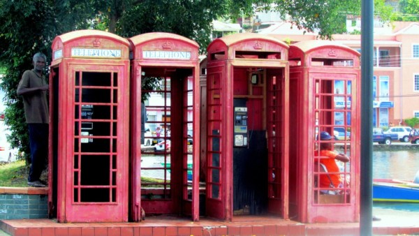 Old British style telephone boxes without telephones