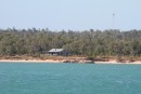One of the many fishing shacks on the shoreline along this coast.