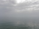 A strange fog-like haze overtook us causing the water and sky to look the same. 