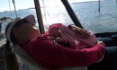 Mom and daughter snooze while we sail.