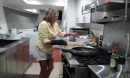 Sarah cooking in Chagos