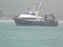 Fishing boat anchored next to us during challenging conditions in Bryan