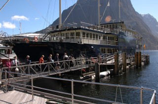 M/V Milford Mariner, Milford Sound, NZ.  Our trusty Milford Sound cruiseship, built about 2001 for exacty this purpose.  Draft 6 feet.  she can get within a few feet of the surrounding cliffs AND DID SO REPEATEDLY.