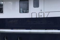 Wondering if there is more to the very large boat we are next to, than originally meets the eye! : The name is Bond….