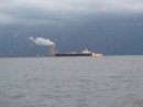 A tanker passing the nuclear plant on Delaware Bay shortly before a thunderstorm