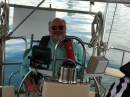 Captain Barry at the helm of an Island Packet