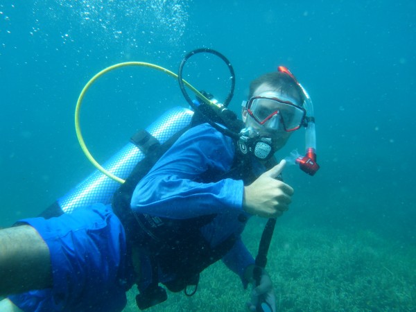 Axel underwater following turtles at Tioman. 