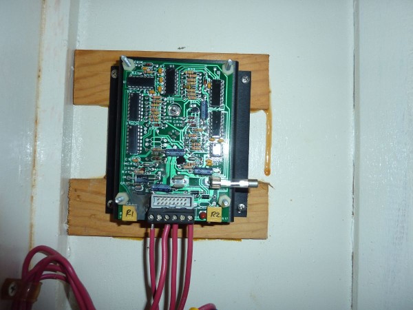 Fried voltage regulator. Look at the lower left corner and you can see the burn mark.