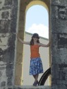 Hannah by the door of an old windmill, Bellevue Plantation, Marie Galante 