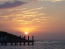 Sunset over Farmers Cay Yacht Club dock
