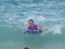 Hannah surfing the waves on Flamenco