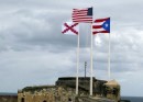 three flags over San Felipe Del Morro- the flag of Burgundy, the U.S. and Puerto Rico