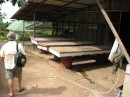 Banana drying beds (under wooden covers).
