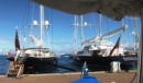 The mega yachts on the pier behind Cetacea