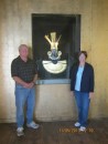 Tony and Gail at the Larco Museum with a display of a typical ceremonial headdress and jewelry.