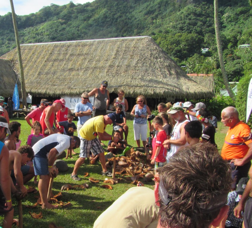 Coconut husking relay race.