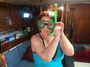 Jessica donning her snorkeling gear: Jessica getting ready for her first snorkeling adventure on the coral reefs of Cuastecomate, Mexico 
