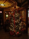 Inside, a merry tree adorns an entry hall corner. (Meehans Irish Pub, Historic St. Augustine FL)