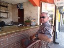 Jim awaits his cafe con leche at Pequena Suiza, Boca Chica, Dominican Republic.