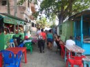 After a lovely lunch at Oceano, we avoid the beach throngs by taking the street route back toward Puerco Rosado, which is located on the left at the end of this pedestrian alley that connects the street to the beach. (Boca Chica, Dominican Republic)