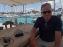 The consultant takes a break and comes up for some fresh air. (Jim aboard Van Straelen, Marina ZarPar, Boca Chica, Dominican Republic.)   