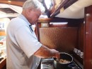 Here Jim stirs the pot on our 3-burner stove aboard Radio Flyer. (For more photos of chutney-making, see sub-album MAKING MANGO CHUTNEY)