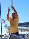 Jim prepares the genny halyard for the operation. (Rivers Edge Marina, St. Augustine FL)
