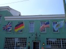 International flags flap in the breeze above JP Henley, one of our favorite watering holes. (Historic St. Augustine FL)