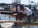 Meanwhile, Capt. Mike takes care of things on deck.