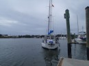 We cast off lines and wave Bon Voyage as Amaroo leaves the dock. (S/V Amaroo of Munich, Germany, San Sebastian River, St. Augustine FL)