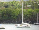 Cactus Wren anchored in Hiva Oa crowded, tiny anchorage with both bow and stern anchors