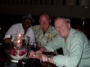 On our last night in Provo, Robert takes us to Ocean Club in Grace Bay where our friend Dr. Euan Menzies has arranged for some of our friends to meet us. From left: Peter Stubbs, owner of PTV (Provo Television), Jim, and Dr. Menzies at the bar.