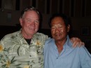 Jim with golfing buddy J.P. from Thailand (right), who now owns a Thai restaurant in Grace Bay.